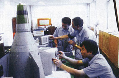 Chinese engineer working on the LT-2's guidance system